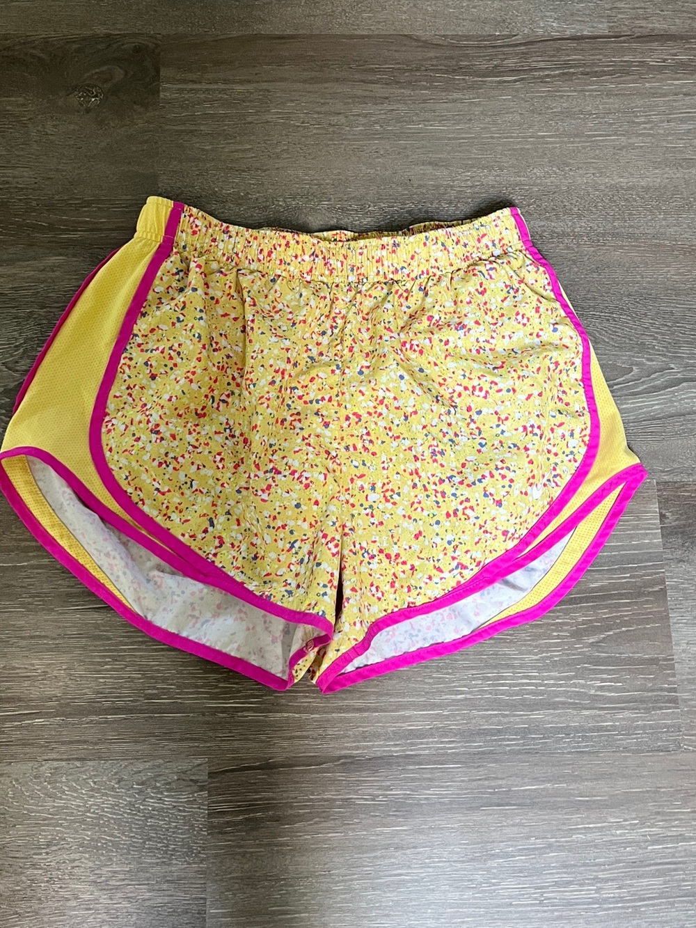 Nike Yellow Floral Athletic Shorts with Pink Trim